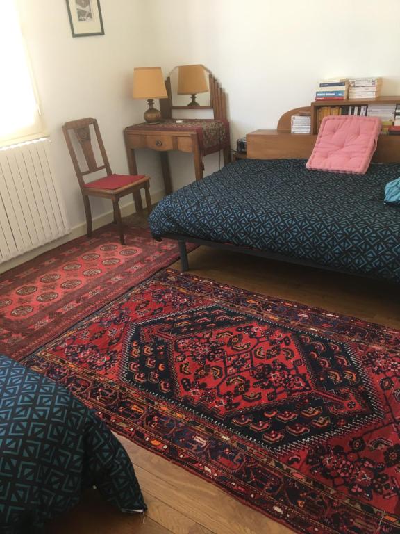 Postel nebo postele na pokoji v ubytování Le Tilleul