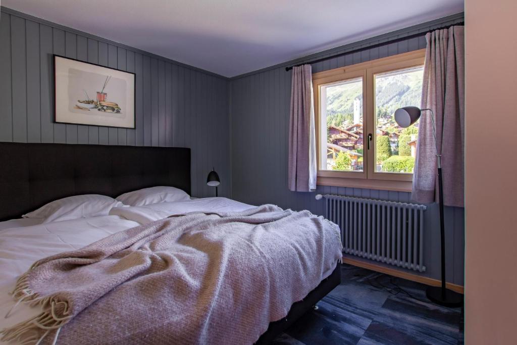 Postel nebo postele na pokoji v ubytování Shed HOTEL