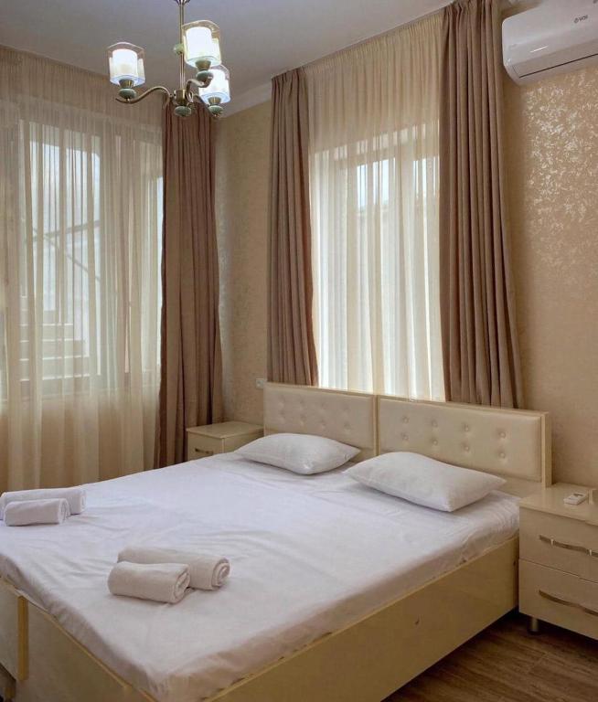 Postel nebo postele na pokoji v ubytování Central Kvareli