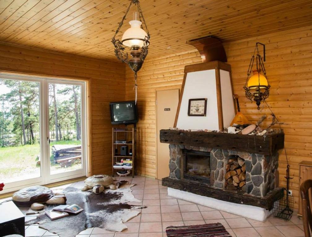 TV a/nebo společenská místnost v ubytování Kaluri Guesthouse