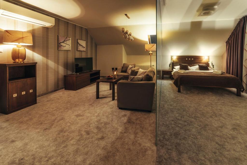 Postel nebo postele na pokoji v ubytování Złoty Groń Resort & Spa