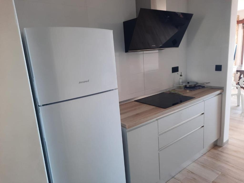 Kuchyňa alebo kuchynka v ubytovaní apartamento deluxe cau del llop