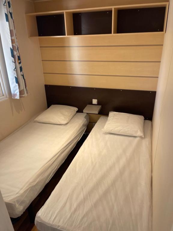 Postel nebo postele na pokoji v ubytování Camping la Paoute