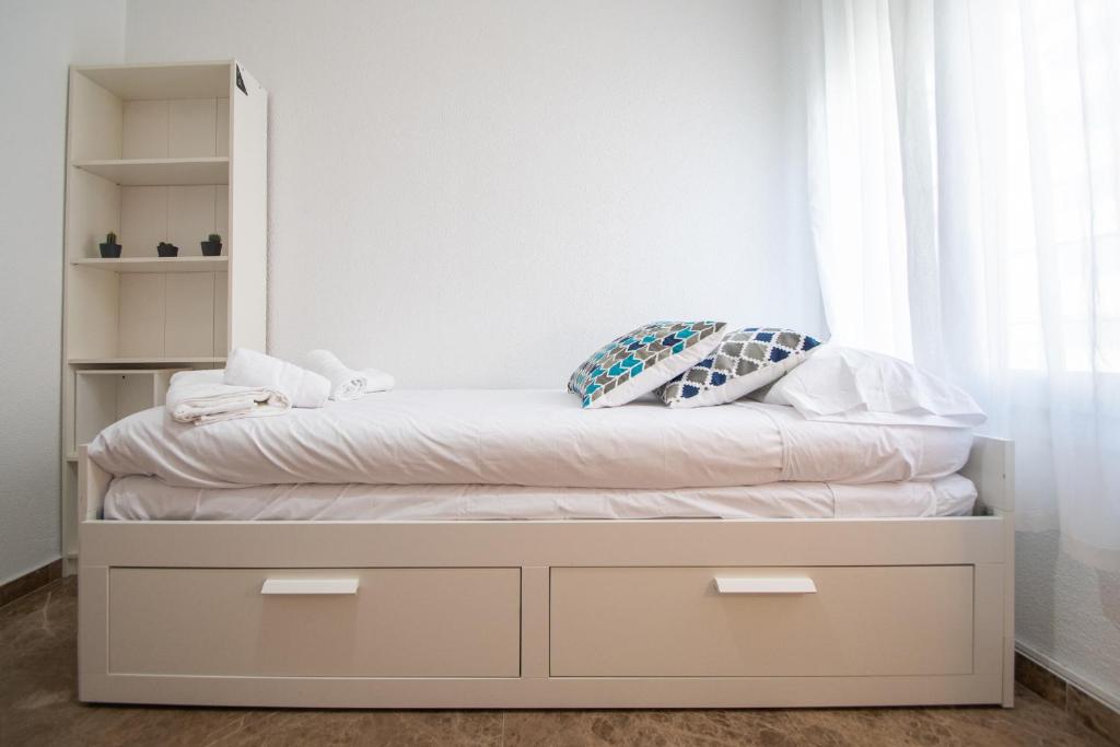 Postel nebo postele na pokoji v ubytování Apartamento El Anteojo de Cádiz