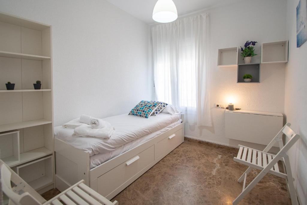 Postel nebo postele na pokoji v ubytování Apartamento El Anteojo de Cádiz
