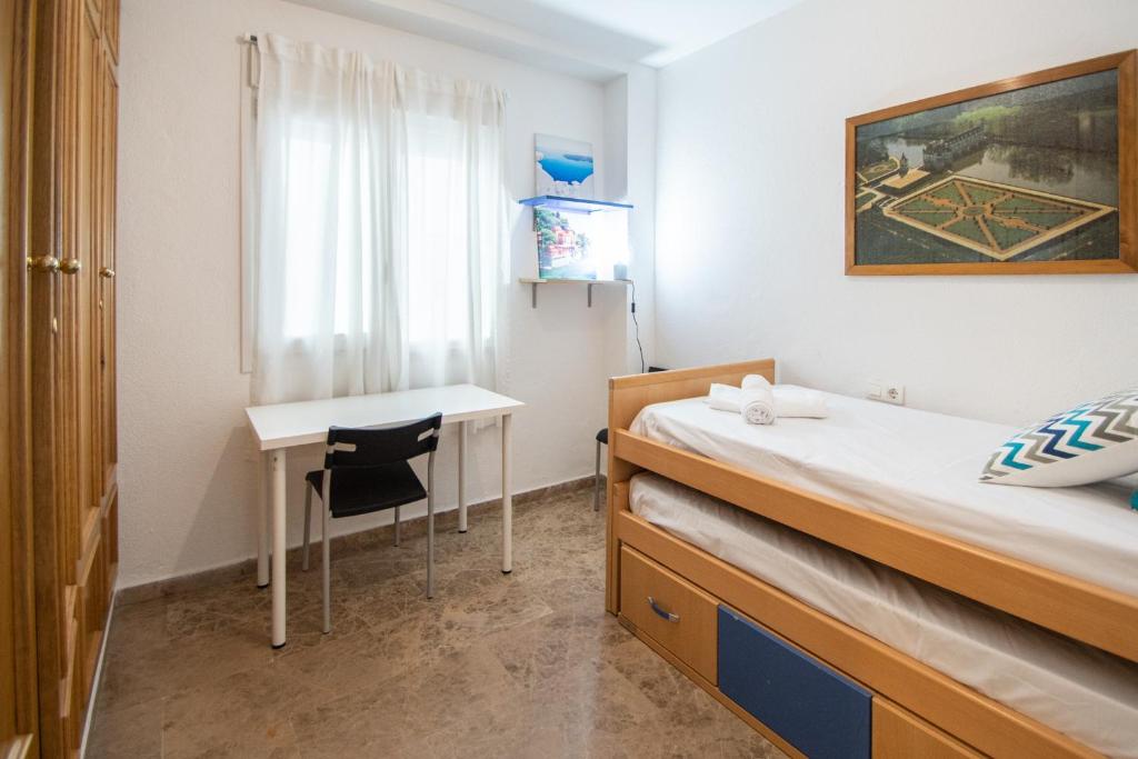 Postel nebo postele na pokoji v ubytování Apartamento El Anteojo de Cádiz