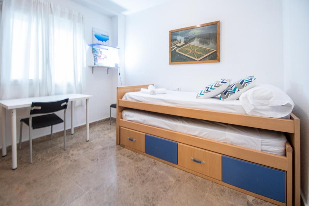 Postel nebo postele na pokoji v ubytování Apartamento El Anteojo de Cádiz