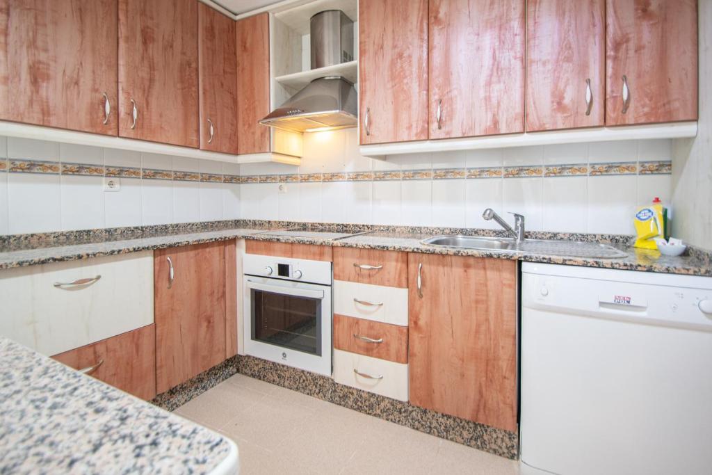 Kuchyň nebo kuchyňský kout v ubytování Apartamento El Anteojo de Cádiz