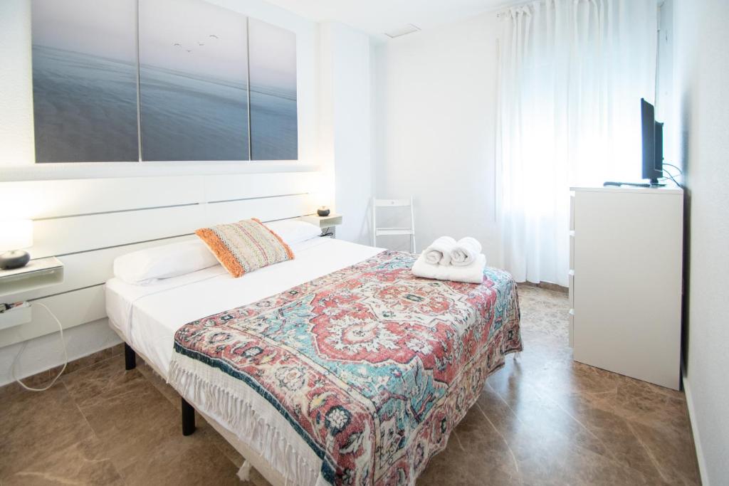 Postel nebo postele na pokoji v ubytování Apartamento El Anteojo de Cádiz