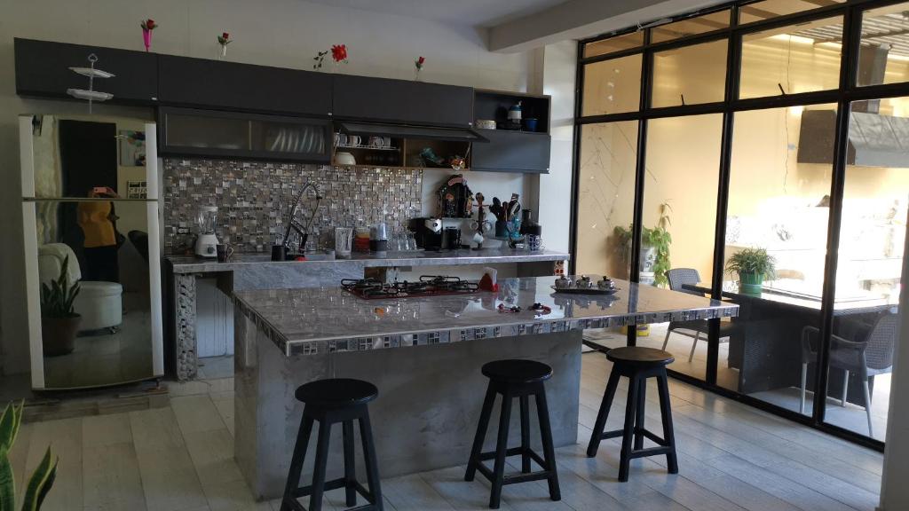 Kuchyň nebo kuchyňský kout v ubytování Casa amazilia