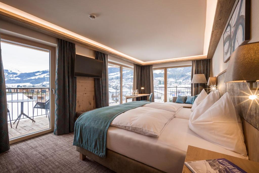 Postel nebo postele na pokoji v ubytování Hotel Zentral ****superior