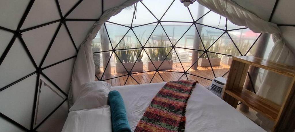 Postel nebo postele na pokoji v ubytování La Cabaña Glamping Geronimo