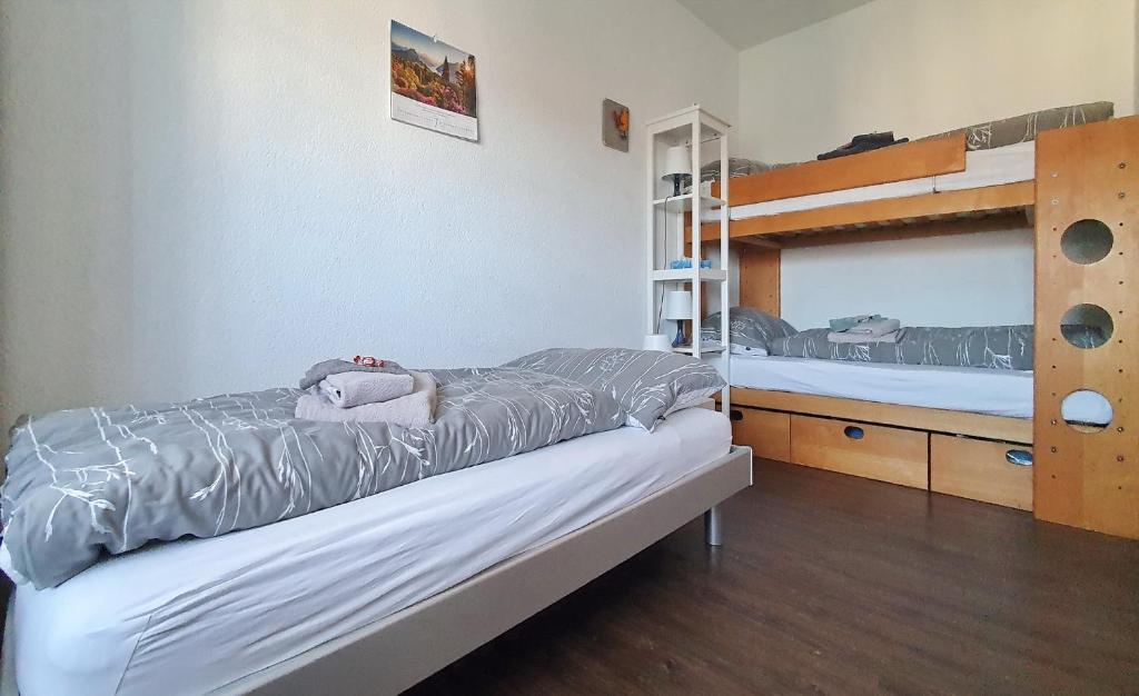 Postel nebo postele na pokoji v ubytování BnB Bergsicht