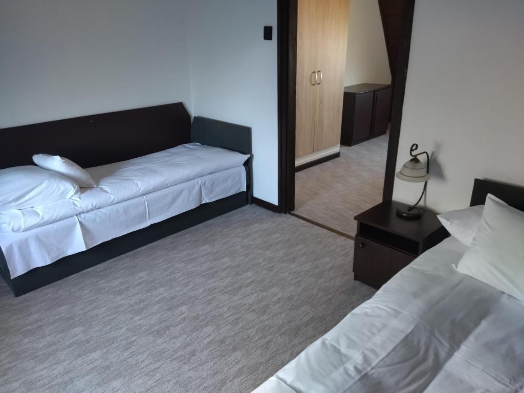 Voodi või voodid majutusasutuse Viking Hotel toas