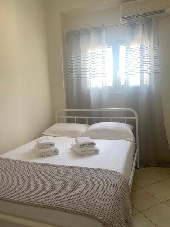 Postel nebo postele na pokoji v ubytování DiFan Sea Homes A5