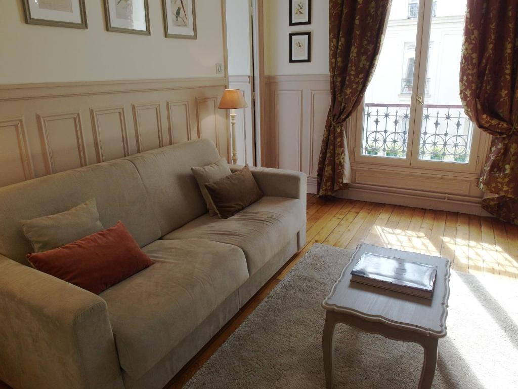 Posezení v ubytování Chambre d hôte : Louvre Elegant Apt Suite