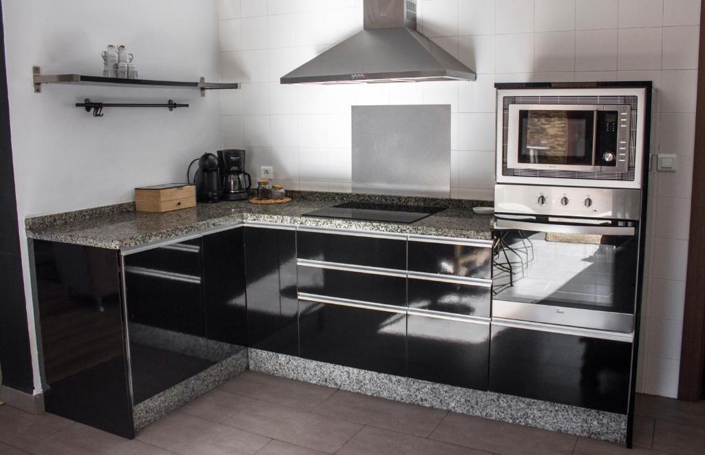 A kitchen or kitchenette at Luz del Tajo