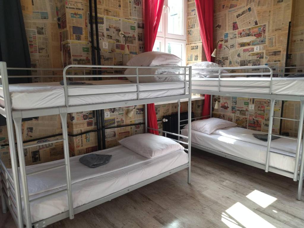 Posteľ alebo postele v izbe v ubytovaní Oliwka Hostel