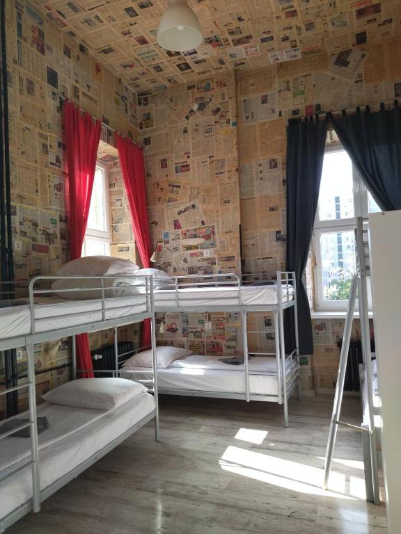 Posteľ alebo postele v izbe v ubytovaní Oliwka Hostel