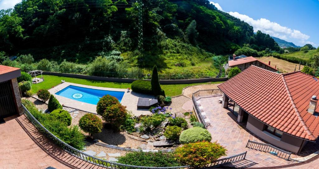 an aerial view of a house with a swimming pool at SARREN VILLA POOL by Urdaibai Rentals in Bermeo