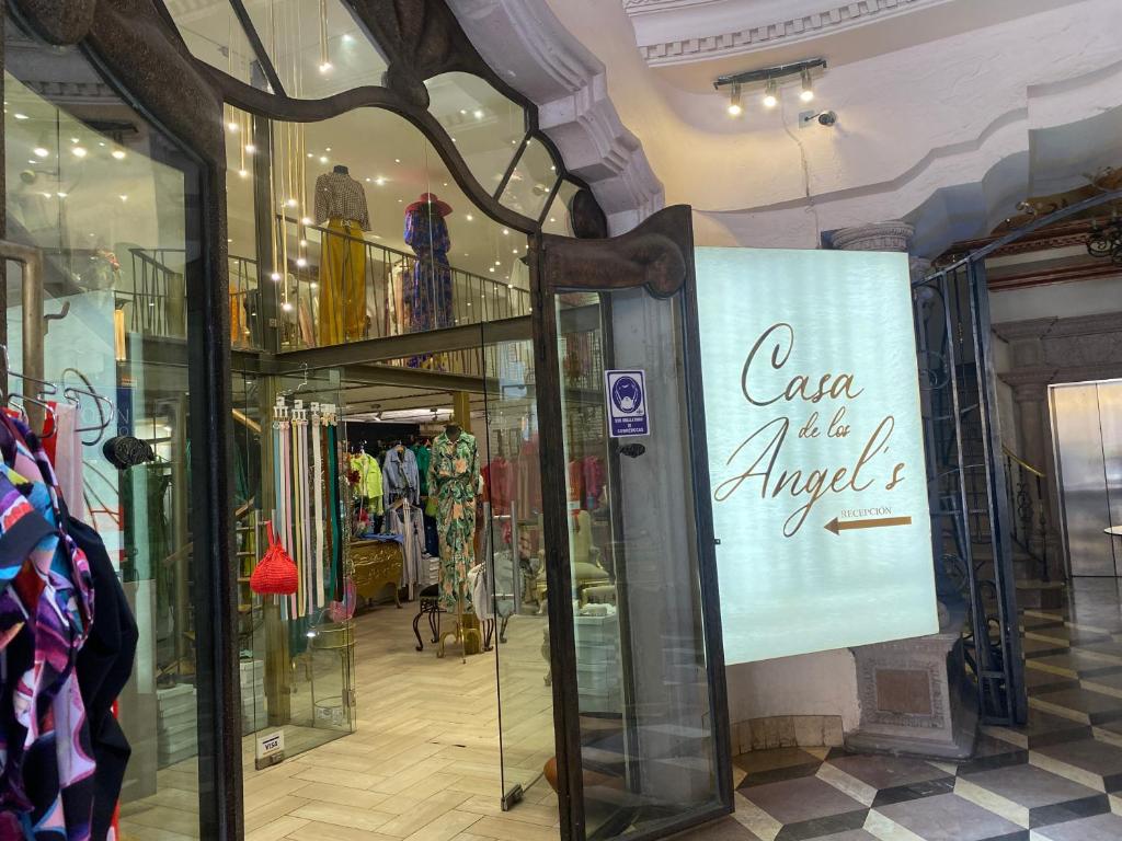 a store with a sign that reads case is an answer at Hotel Casa de los Angel's in San Juan de los Lagos