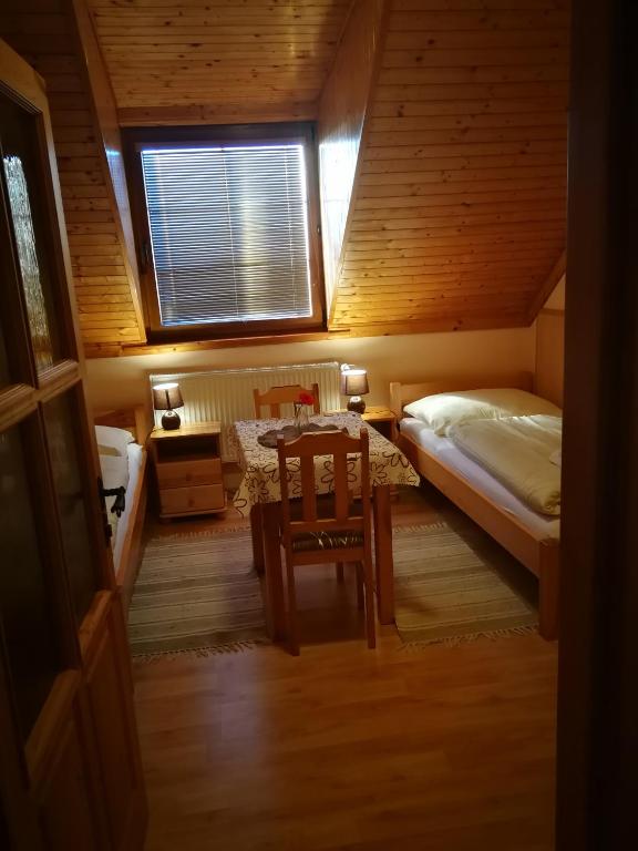 Postel nebo postele na pokoji v ubytování Pod palmou Gerlachov
