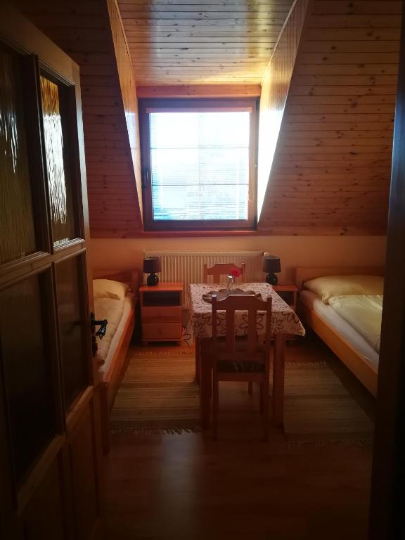 Postel nebo postele na pokoji v ubytování Pod palmou Gerlachov