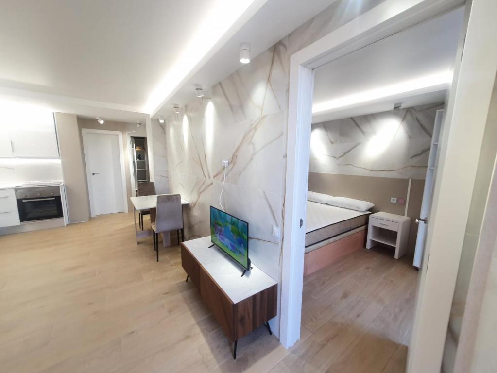 Postel nebo postele na pokoji v ubytování SALOU ,APARTAMENTO CON PISCINA y Wifi