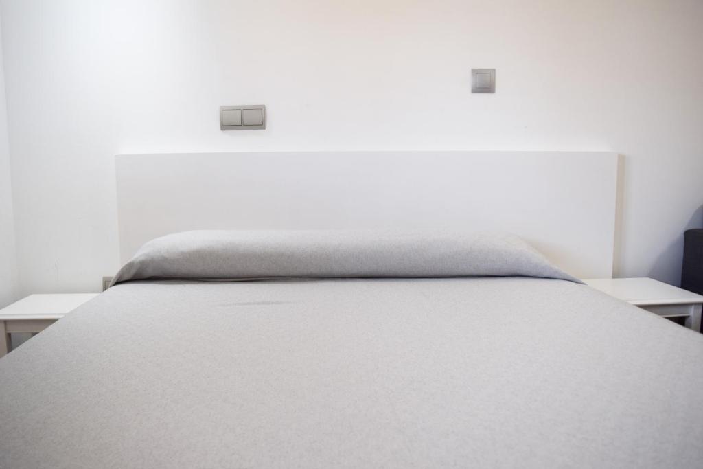 Posteľ alebo postele v izbe v ubytovaní Hotel Mirablau