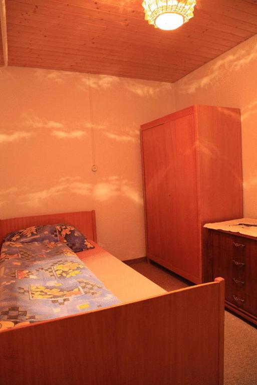 Postel nebo postele na pokoji v ubytování Hotel Guidon Apartments