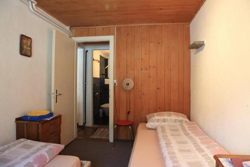 Postel nebo postele na pokoji v ubytování Hotel Guidon Apartments
