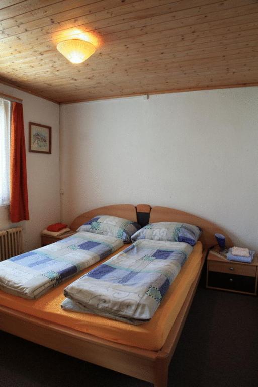 Postel nebo postele na pokoji v ubytování Hotel Guidon Apartments