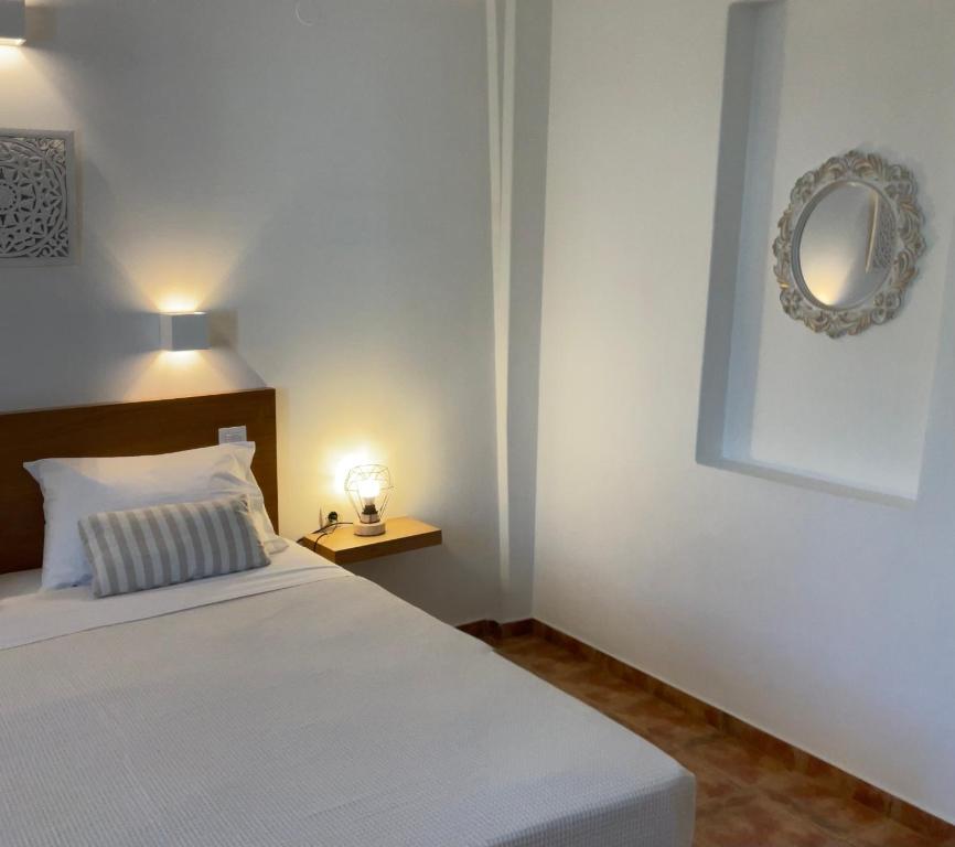 Posteľ alebo postele v izbe v ubytovaní Rodia Studios & Apartments
