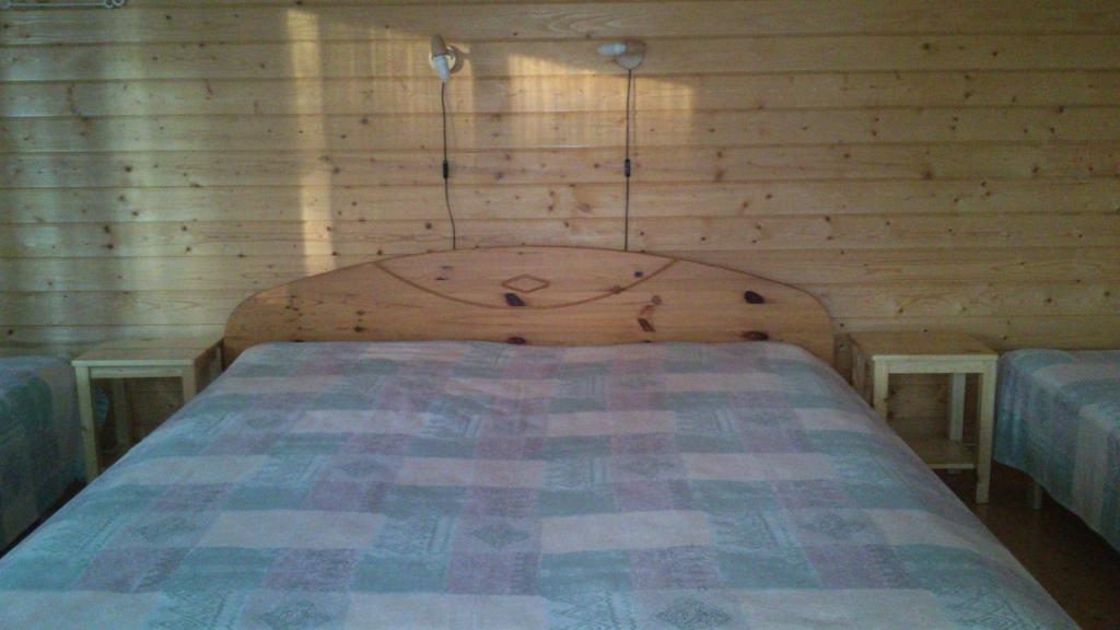Postel nebo postele na pokoji v ubytování Voosemetsa Turismitalu