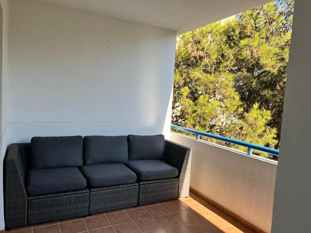 A seating area at Apartamento con terraza, garaje y piscina a 350m playa