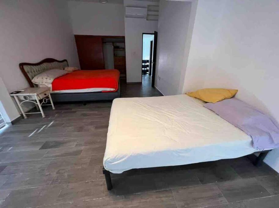 Postel nebo postele na pokoji v ubytování Casa c/embarcadero en Boca del Río Gran Ubicación