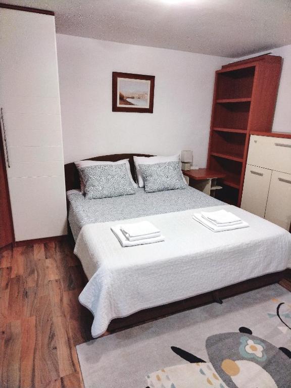 Posteľ alebo postele v izbe v ubytovaní BonBon condominium
