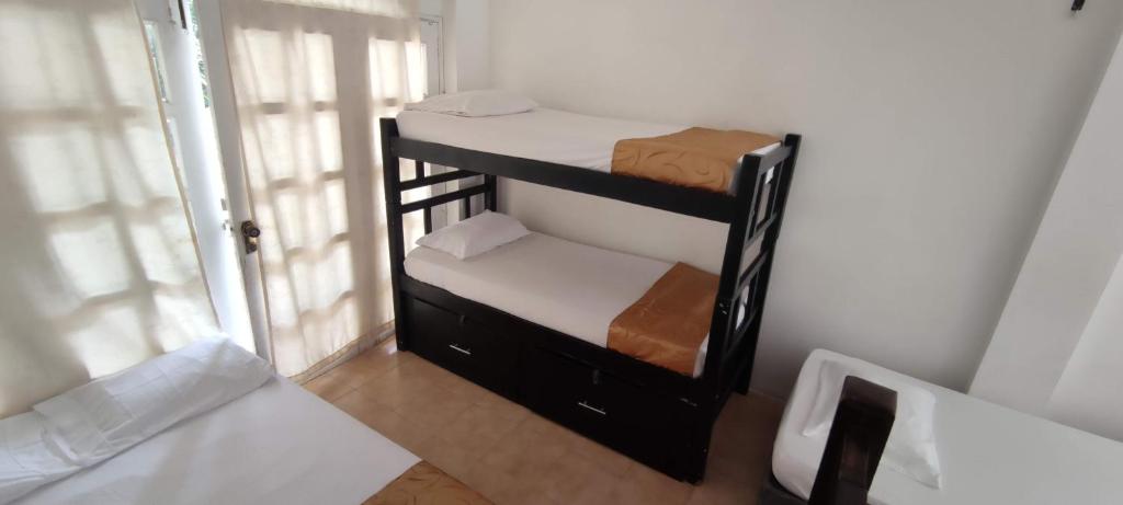 Postel nebo postele na pokoji v ubytování Cabaña Salguero