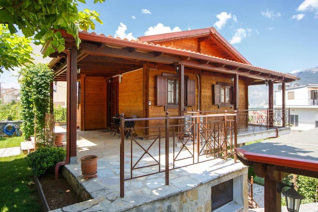 a house under construction with scaffolding at WOODEN HOUSE IN IOANNINA in Ioannina