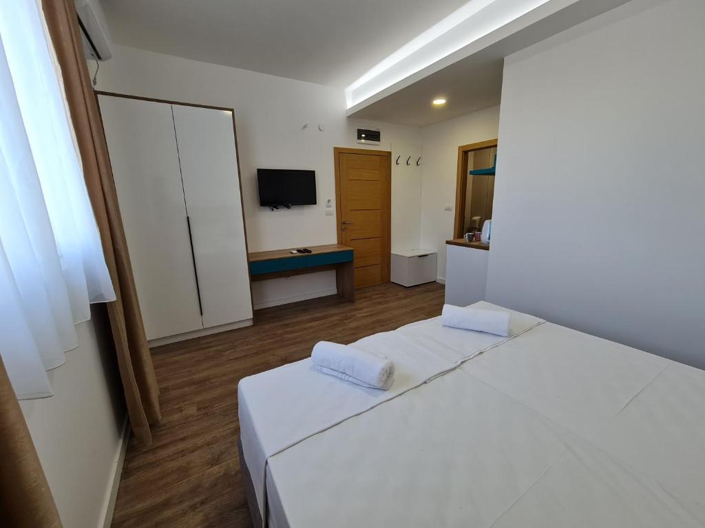 Postel nebo postele na pokoji v ubytování Vila Hercegovka