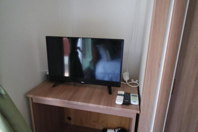 TV a/nebo společenská místnost v ubytování Moon-hyo House 1