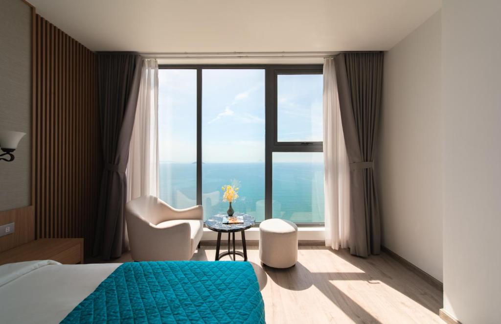 Postel nebo postele na pokoji v ubytování Navada Beach Hotel