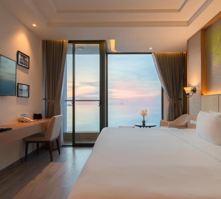 Postel nebo postele na pokoji v ubytování Navada Beach Hotel