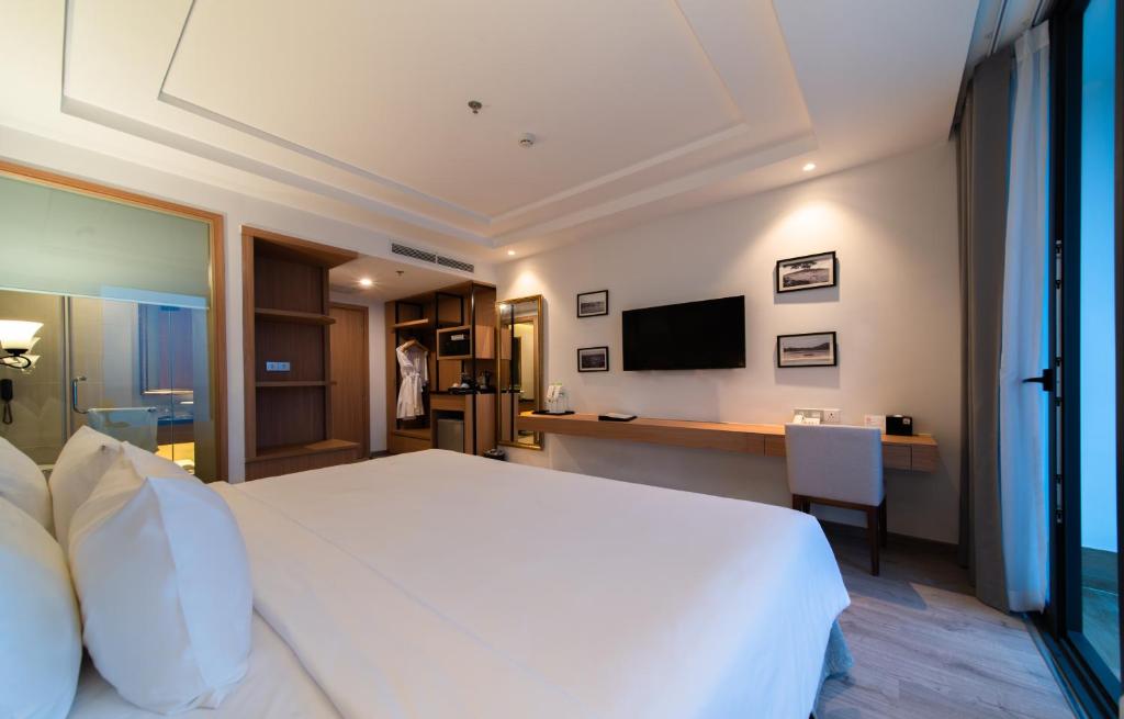TV a/nebo společenská místnost v ubytování Navada Beach Hotel
