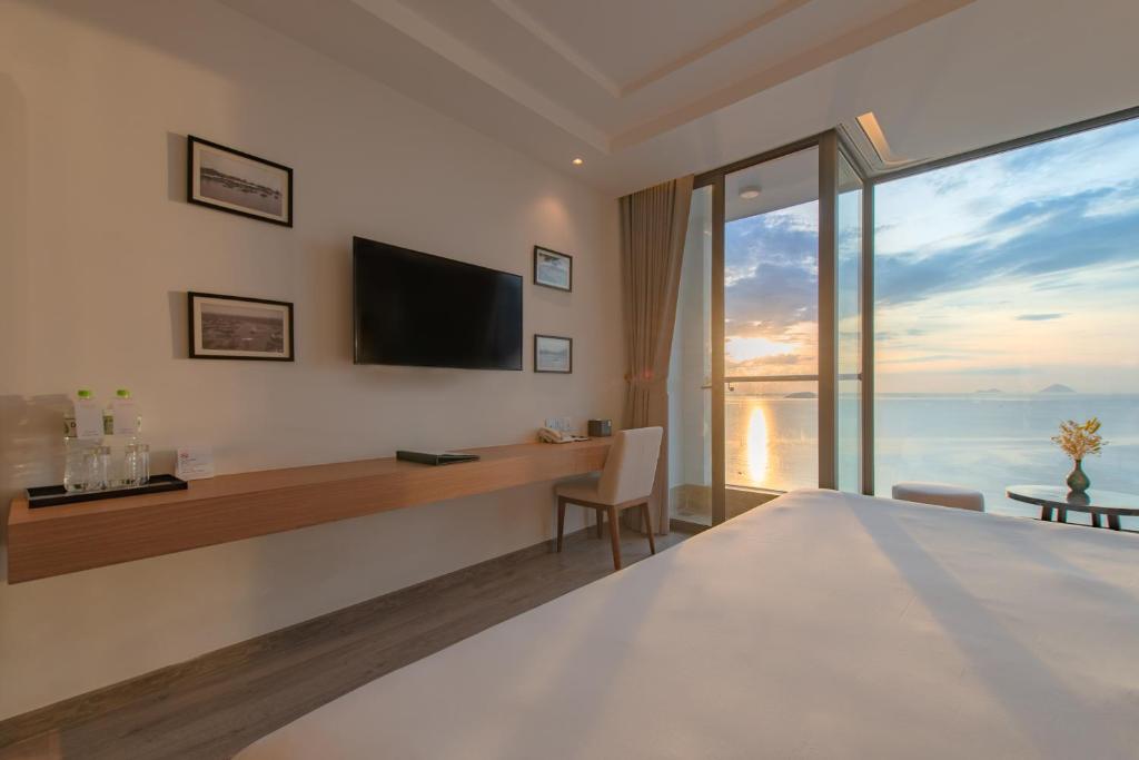 TV a/nebo společenská místnost v ubytování Navada Beach Hotel
