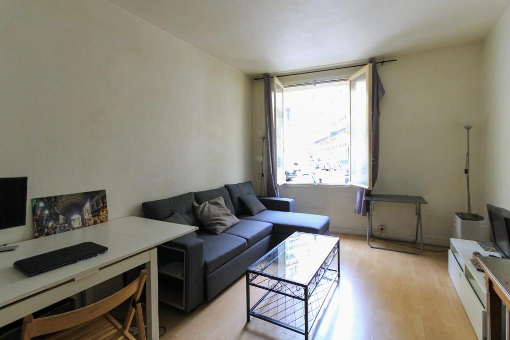 Zona d'estar a Charming Studio With View Near The Sacré Coeur!