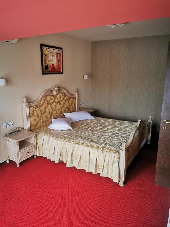 Postel nebo postele na pokoji v ubytování Hotel Q Art Severus