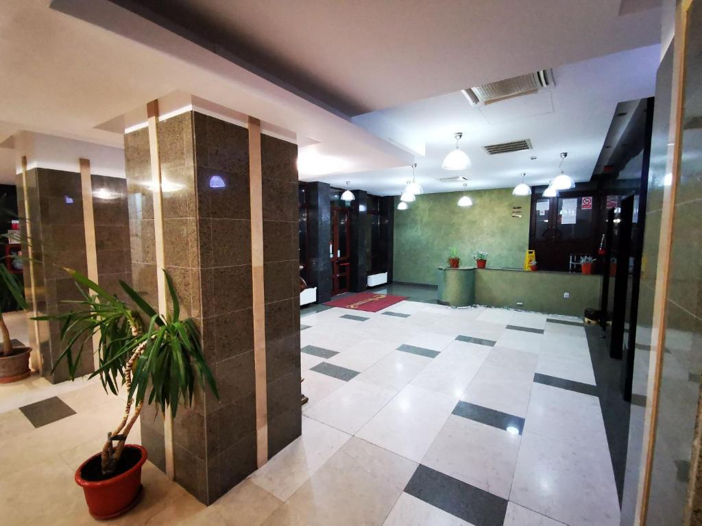 TV a/nebo společenská místnost v ubytování Hotel Q Art Severus