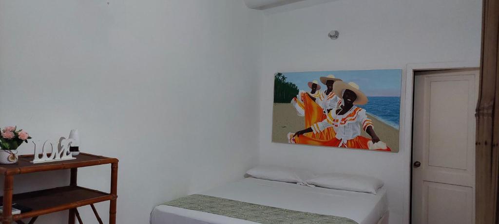Postel nebo postele na pokoji v ubytování Caramba Hospedaje
