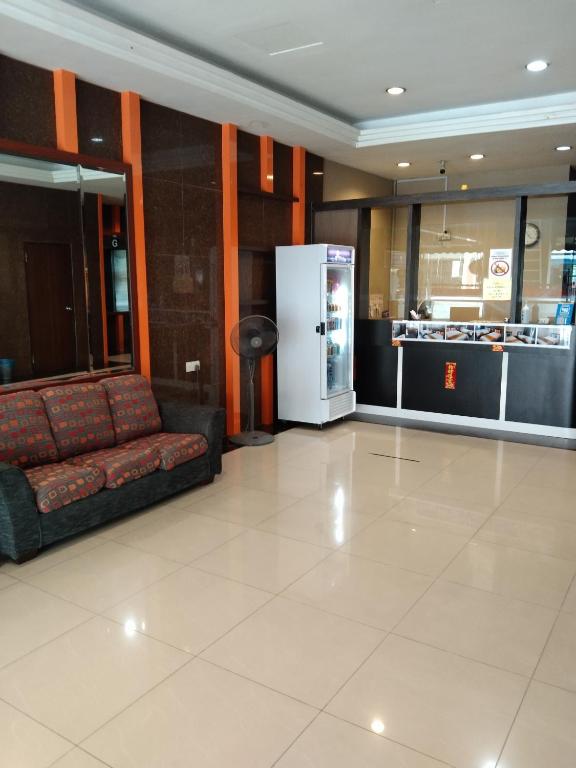 Kuchyň nebo kuchyňský kout v ubytování One World Hotel